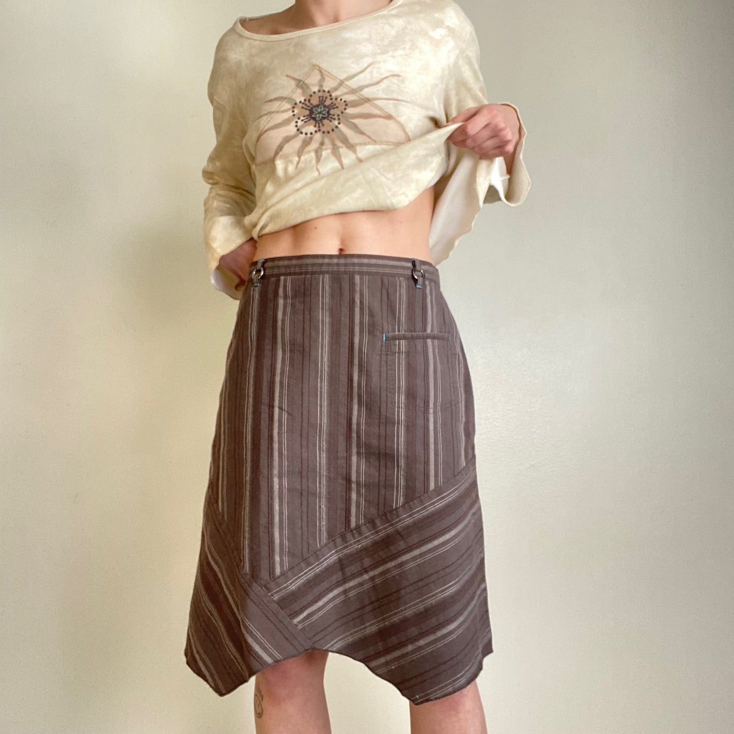 Striped asymmetrical hem skirt