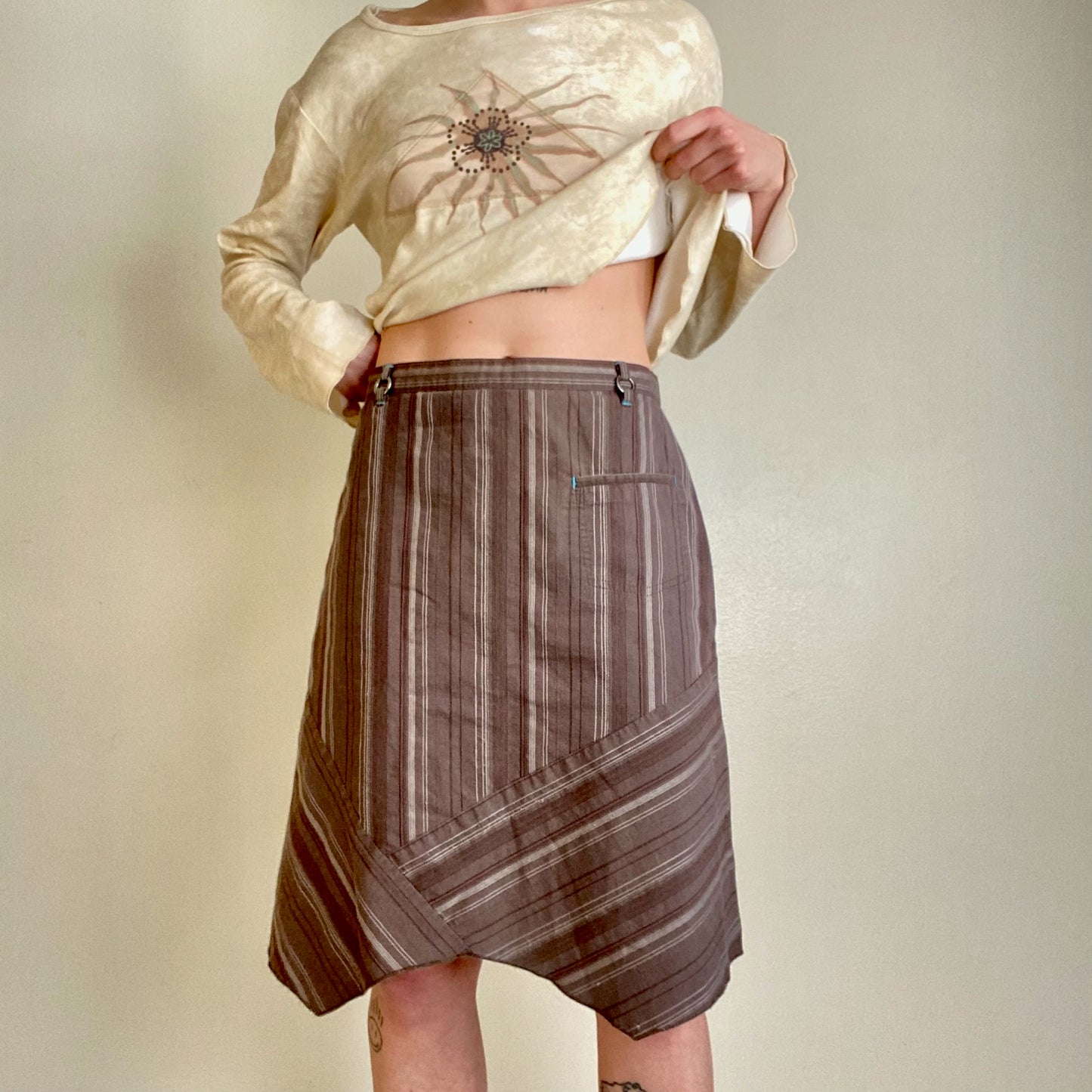 Striped asymmetrical hem skirt